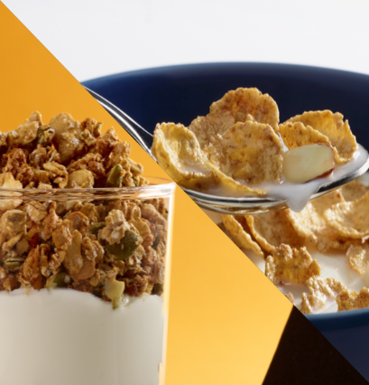 Granola with yogurt and a spoonful of cereal with milk on a yellow and blue background.